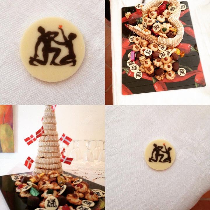 Fire fotos fra en fest: hvide chokolader med et sort papirklip af et par trykt på, og en kransekage med flag.
